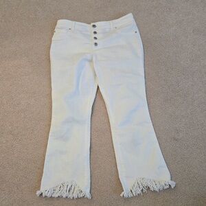 Walk the runway in these fun fringe cropped jeans